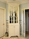 Specialty fretwork door cabinet built by Tom Scott
